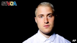 Singer-songwriter Mike Posner poses for a portrait in Los Angeles, March 4, 2016.