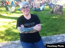 Melissa Thomas, a 47-year-old technology specialist in Washington, D.C., got her tattoos at age 40. (Anna Matteo/VOA)