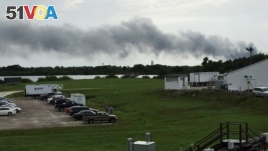 Smoke rises from a SpaceX launch site Thursday, Sept. 1, 2016, at Cape Canaveral, Fla. NASA said SpaceX was conducting a test firing of its unmanned rocket when a blast occurred. 