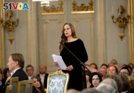 Sara Danius, Professor of Aesthetics, makes the traditional speech over her precursor Knut Ahnlund at the annual meeting of the Swedish Academy in the Old Town of Stockholm, Sweden