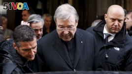 FILE - Australian Cardinal George Pell leaves at the end of a meeting with the victims of sex abuse, at the Quirinale hotel in Rome, Italy, March 3, 2016. (REUTERS/Alessandro Bianchi)