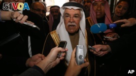 Saudi Arabia's Minister of Petroleum and Mineral Resources Ali Ibrahim Naimi speaks to journalists at a hotel in Vienna, Austria, Tuesday, Dec. 1, 2015. Saudi Arabia is OPEC's biggest oil producer.