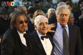 Actor Al Pacino, from left, director Martin Scorsese and actor Robert De Niro pose for photographers upon arrival at the premiere of the film 'The Irishman' as part of the London Film Festival, in central London, Sunday, Oct. 13, 2019.