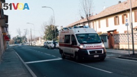  An ambulance is seen driving down a road in San Fiorano, one of the towns on lockdown due to a coronavirus outbreak, in this picture taken schoolteacher Marzio Toniolo in San Fiorano, Italy, February 22, 2020.