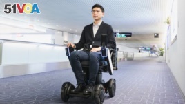 This photo provided by WHILL, Inc., shows the trial of the company's Autonomous Drive System at Haneda Airport in Tokyo in November, 2019.