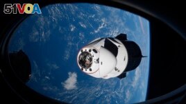 Orbiting items, such as this SpaceX capsule launched in 2021, remain at risk of being interfered with by space junk. Space junk is the name for unwanted or no longer useful items in space orbiting Earth. (NASA via AP, File)