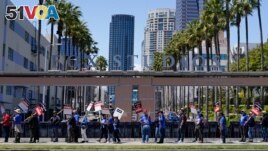 Members of the the Writers Guild of America picket outside Fox Studios on Tuesday, May 2, 2023, in Los Angeles, California.(AP Photo/Ashley Landis)