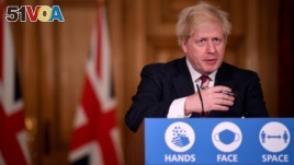 Britain's Prime Minister Boris Johnson speaks on Dec. 19, 2020, during a news conference about a new kind, or strain, of the coronavirus that has been identified in Britain and South Africa. (REUTERS)