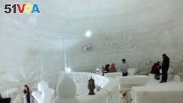 Inside view of igloo cafe with seats covered by sheepskin in Gulmarg. (Bilal Hussain/VOA)