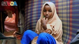 Nurta Mohamed is a Somali girl sitting inside her mom's home in Garasbaaley district of Mogadishu, Somalia on Aug. 14, 2020.