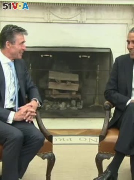 Obama, Rasmussen Meet as Multiple Crises Face NATO