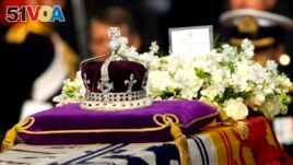 Hundreds of thousands of people are expected to flock to London's medieval Westminster Hall from Wednesday, Sept. 14, 2022, to pay their respects to Queen Elizabeth II, whose coffin will lie in state for four days until her funeral on Monday. (AP Photo/Alastair Grant, File)
