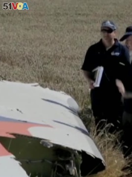 Investigators Finally Reach MH17 Crash Site