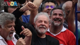 Former Brazilian President Luiz Inacio Lula da Silva gestures after being released from prison, in Sao Bernardo do Campo, Brazil, Nov. 9, 2019. 