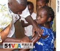 File photo of a girl being vaccinated against meningitis at a medical center in Ouagadougou, Burkina Faso