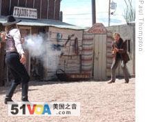 Actors recreate a gunfight in Tombstone