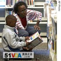 A mother and son choose books at a library in Richmond, Virginia