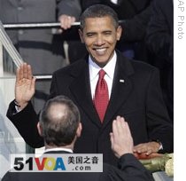 Barack Obama takes the oath of office from Chief Justice John Roberts
