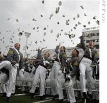 Cadets at the U.S. Military Academy at West Point celebrate graduation as Army officers on May 23