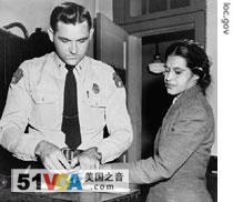 Rosa Parks is fingerprinted after refusing to move to the back of a bus.