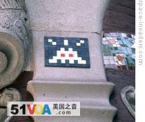One of Space Invader's works on a building in Barcelona, Spain