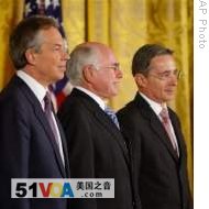 Bush Honors Blair, Howard, Uribe