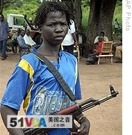 An LRA boy soldier, Samuel Okumu, stands at the Sudan/DRC border, (file photo)
