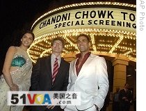From left to right, actress Deepika Padukone, Warner Bros. President Alan Horn, and actor Akshay Kumar arrive at a screening of 'Chandni Chowk To China' in Burbank, California, 7 Jan. 2009