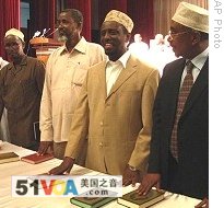 Newly nominated opposition MPs from Alliance for Re-Liberation of Somalia (ARS) take oath during ceremony in Djibouti, 28 Jan 2009 
