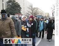People waiting in line to enter restricted area reserved for Silver ticket holders ahead of Obama swearing-in ceremony, 20 Jan 2008