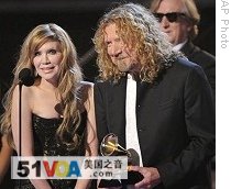 Alison Krauss, left, and Robert Plant accept award for Album of the Year at the 51st Annual Grammy Awards, 8 Feb. 2009