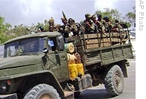 Ethiopian soldiers on truck during a farewell ceremony which took place at the presidential palace, Mogadishu, Somalia, 13 Jan. 2009