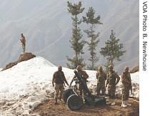 Pakistani soldiers man mortar position near the Shangla Pass overlooking Swat valley