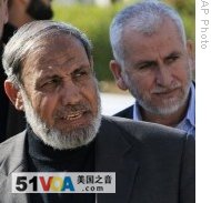 Senior Hamas leader Mahmud Zahar (l) and top Hamas official Said Siam (r) return from Egypt at the border at Rafah, southern Gaza Strip, 02 Feb 2009