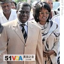 A file photo taken on 16 Nov 2008 shows President Joao Bernardo Vieira and his wife Isabella arrive to vote in Bissau