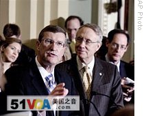 Senate Budget Committee Chairman Kent Conrad (L), and Senate Majority Leader Harry Reid at a news conference, Capitol Hill, 25 Mar 2009