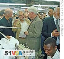 Bill Clinton visiting a garment factory in Haiti, 10 Mar 2009