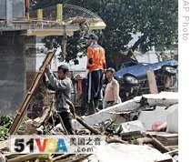 At Least 77 Killed in Indonesia Dam Burst
