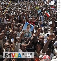 Thousands of supporters cheer during a speech delivered by Sudanese President Omar al-Bashir, unseen, at the entrance of the presidential palace in Khartoum, Sudan, 05 Mar 2009