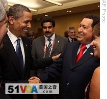 President Barack Obama, left, shakes hands with Venezuela's President Hugo Chavez before the opening session of the 5th Summit of the Americas in Port of Spain, Trinidad and Tobago, 17 April 2009