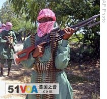 Somali al-Shabab militiamen seen during exercises at their military training camp outside Mogadishu, (2008 file photo)