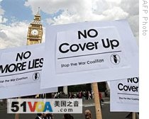 Demonstrators hold placards with the words 'No Cover Up' and 'No More Lies' outside Houses of Parliament in London, 15 Jun 2009