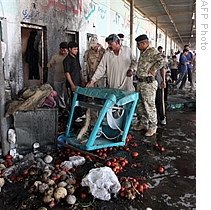 Explosion Rips Through Baghdad Market