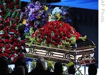 Michael Jackson's casket is displayed at the public memorial service held at Staples Center in Los Angeles, 7 July 2009 