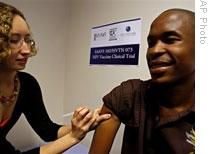 Dr. Danielle Crida shows how an experimental AIDS vaccine would be tested at a health center near Cape Town, South Africa