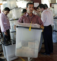 Electoral workers sort through ballot boxes the day after special early voting for the Kurd-run region in northern Iraq, in Sulaimaniyah, 24 Jul 2009