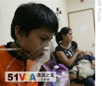 A boy in Lima, Peru gets treatment for asthma