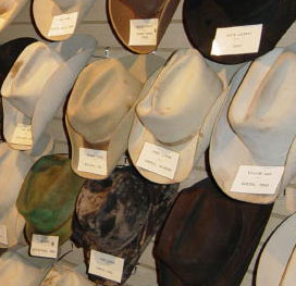 Cowboy hats of all shapes and sizes from Nat's collection line the walls of the North Texas Museum.