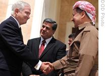U.S. Defense Secretary Robert Gates is greeted by President of the Kurdistan Regional Government Massoud Barzani during a brief visit to Erbil, Iraq, 29 Jul 2009
