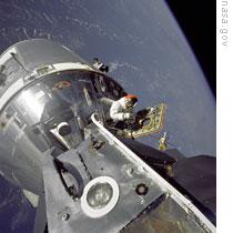 Astronaut David Scott tests linking the lunar lander to the command module on Apollo 9 